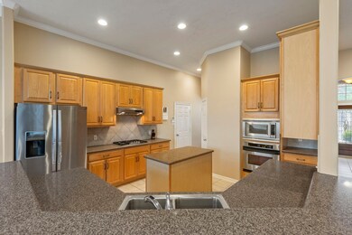 The kitchen is complete with  a breakfast bar!