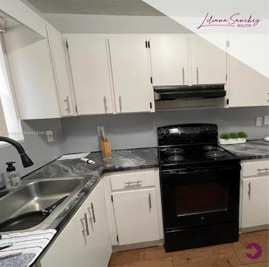 7755 W 30th Ct unit E210, Hialeah, FL 33018 - photo 2