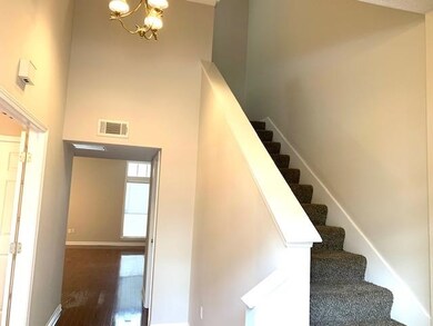 Two story entry leads to 2 living spaces downstair