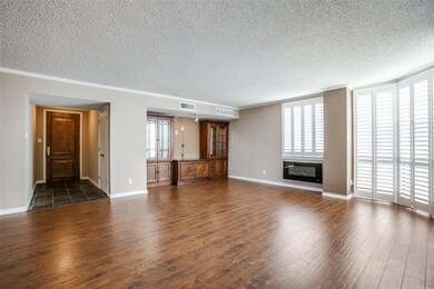Entry with coat closet. Living room with laminate 