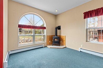Miscellaneous room featuring a baseboard radiator,