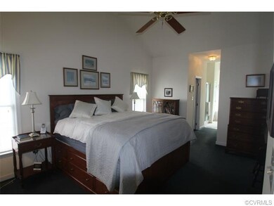 Master bedroom with vaulted ceiling