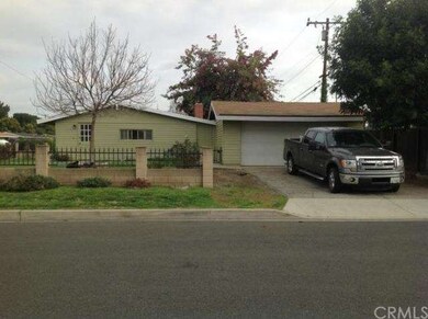 Ardilla St side of house. 2 car garage with garage