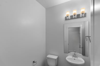 Bathroom featuring a sink and toilet