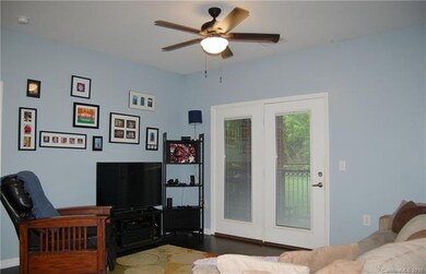 Inviting living room is open to the dining and kit