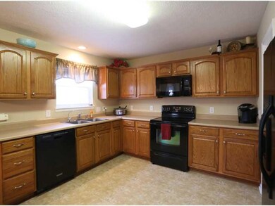 Kitchen. The kitchen offers plenty of cabinet space with electric stove (with convection oven), microwave, dishwasher (Whisper Quiet Kitchenaid) and refrigerator.