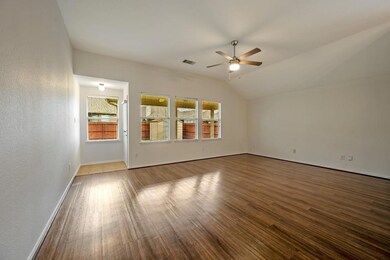 Unfurnished room with hardwood / wood-style floors