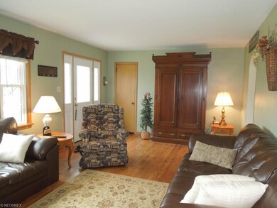 Bright and airy living room with beautiful wood fl