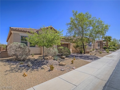 View of front of house featuring stucco siding, a