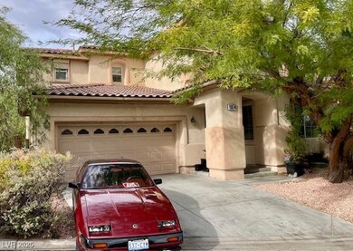 featuring stucco siding, concrete driveway, and a