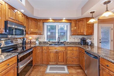 Granite counter tops, tile back splash, SS applian