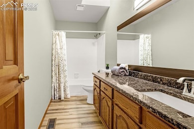 Full bathroom upstairs with skylight