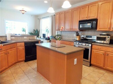 Kitchen has plenty of cabinet and counter space.
