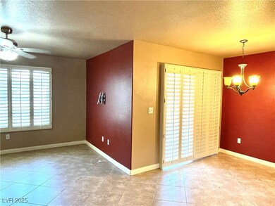 Family room with tiled flooring and open floorplan
