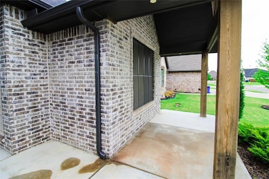View of patio with covered porch