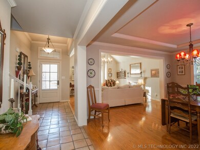 A spacious, open area contain the living and dinin