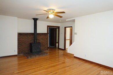 Bedroom & bath off of separate hallway near ki