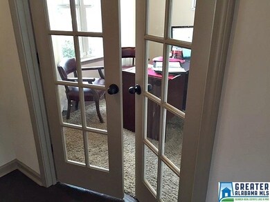 with French doors, vaulted ceiling with designer p