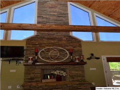 A gorgeous stone fireplace in the living area.