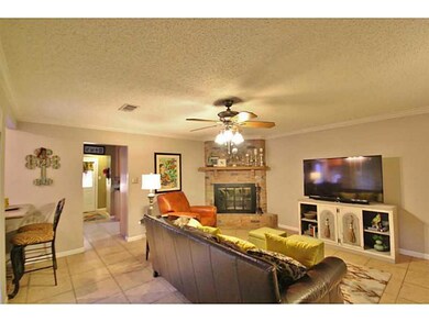 Photo. Another view of den with bar area.