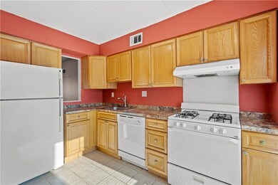 Kitchen with pass through open to Dining area