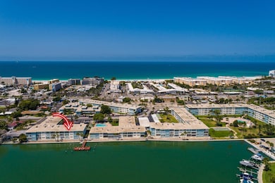 #55 is a short walk to the beach or relax on the dock.