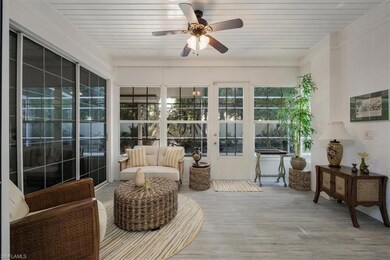 Sunroom / solarium with wood finished floors and wooden ceiling