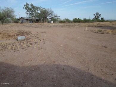 across lot from west