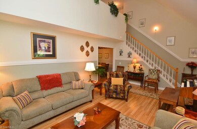 Open loft space on second level overlooks living room.