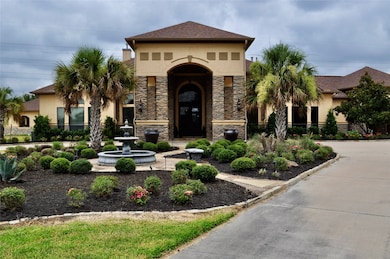 Tranquil fountain and manicured garden welcomes gu