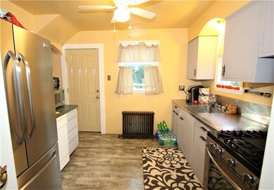 Bright & Airy Kitchen Has a Ceiling Fan, Painted W
