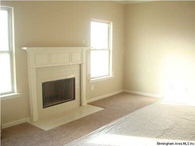 Family room on main floor has a  wood burning fire