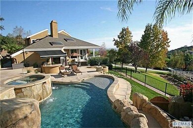 Patio Area overlooking Pool reveals Expansive View