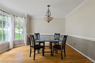 Dining space featuring light wood-type flooring an