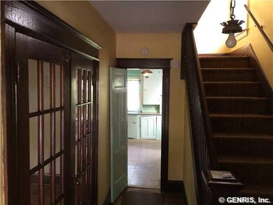 Foyer Looking from front door, French doors to liv