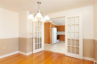 Gleaming hardwood floors and glass...