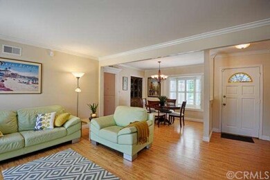 Bright and airy with crown molding and updated flo