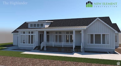 Back of property at dusk featuring board and batten siding, a porch, and roof with shingles