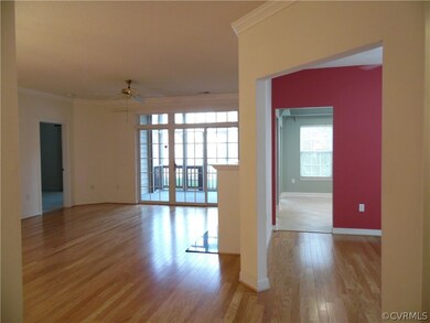 View from entrance foyer showing living room, dini
