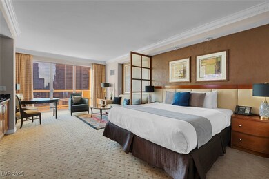 Bedroom featuring ornamental molding and light col
