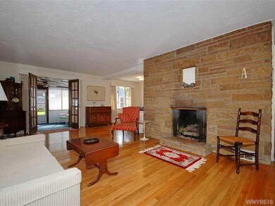Living Room French doors lead to florida room
