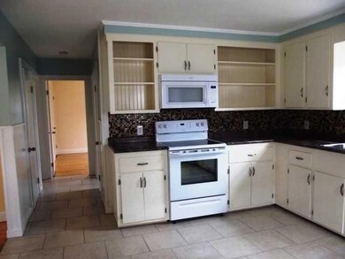 Kitchen. Tile backsplash adds to the...