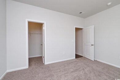 Unfurnished bedroom with carpet floors, a spacious