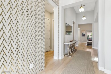 Hallway with unique chevron design tile