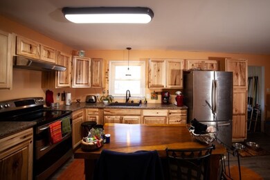 Custom made rustic island with seating.