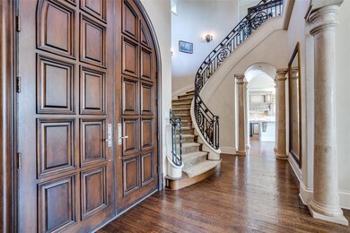 Grand entry with iron circle staircase