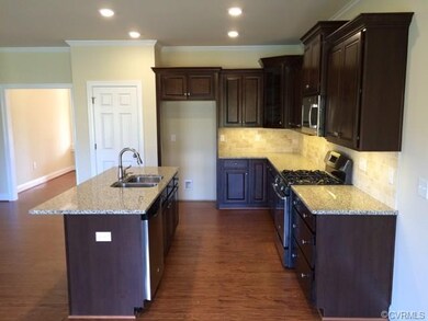 Spacious kitchen with granite countertops