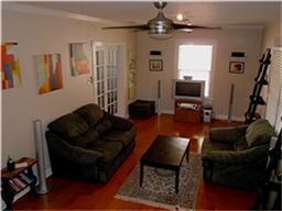 Living Room. Beautiful wood flooring throughout.