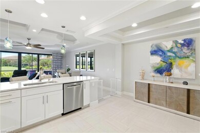 Kitchen with white cabinets, visible vents, backsp