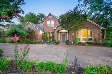 Traditional-style house featuring brick siding and